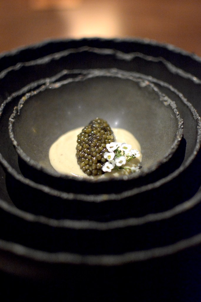 Coffee and caviar in stacked broken-concrete bowls at Seline